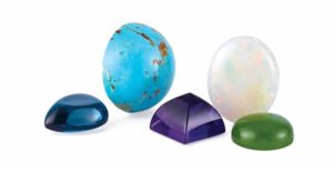 colorful array of cabochon cut gemstones