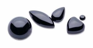 array of cabochon cut gemstones